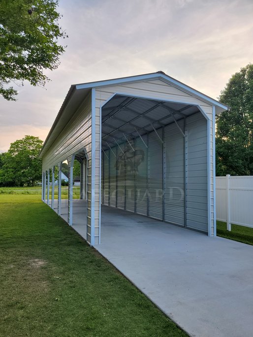 Concrete entrance to cantilever carport