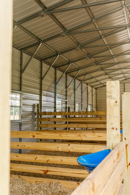 Wood stalls in horse barn